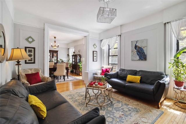 243 W 98th St Unit 2C, New York Manhattan, NY 10025 - living area with a chandelier and hardwood / wood-style flooring