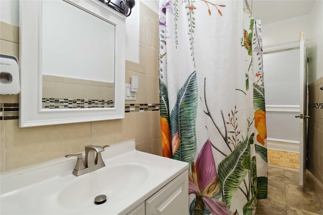 243 W 98th St Unit 2C, New York Manhattan, NY 10025 - full bathroom featuring tile walls, curtained shower, and vanity