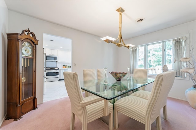 28 Verona Ct, New City, NY 10956 - dining room with light tile patterned floors, baseboards, light carpet, and visible vents
