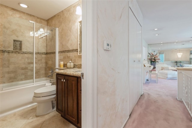 28 Verona Ct, New City, NY 10956 - bathroom with tile walls, toilet, enclosed tub / shower combo, and vanity