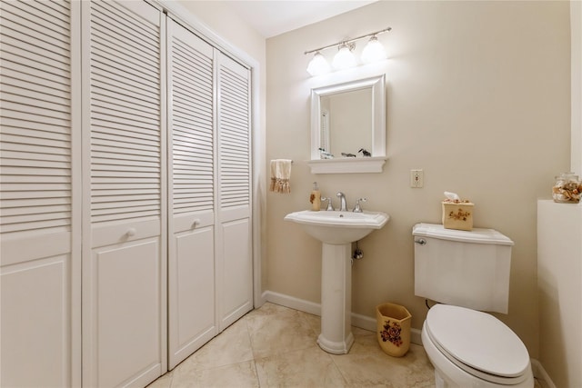 28 Verona Ct, New City, NY 10956 - bathroom featuring toilet, baseboards, and a closet