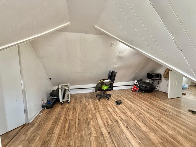 101-14 118th St, Richmond Hill S, NY 11419 - bonus room with lofted ceiling and wood finished floors