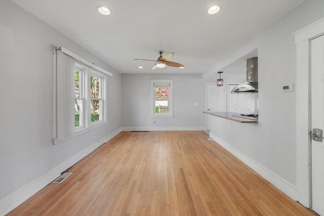 118 N Regent St, Port Chester, NY 10573 - unfurnished living room with recessed lighting, light wood-style floors, a ceiling fan, visible vents, and baseboards