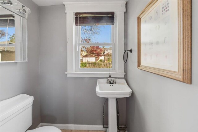 118 N Regent St, Port Chester, NY 10573 - bathroom with a healthy amount of sunlight and toilet