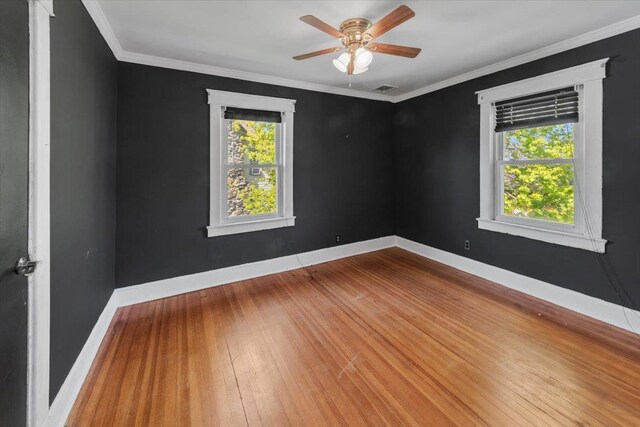 118 N Regent St, Port Chester, NY 10573 - spare room featuring ornamental molding, ceiling fan, hardwood / wood-style floors, and baseboards