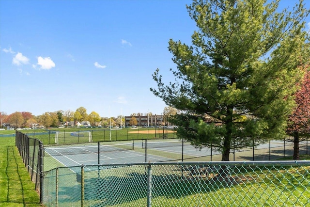 118 N Regent St, Port Chester, NY 10573 - view of tennis court featuring fence and a lawn