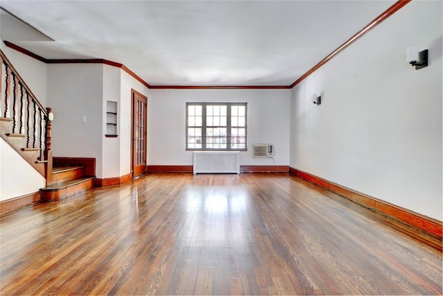 48-42 64th St, Woodside, NY 11377 - unfurnished living room with crown molding, stairs, radiator heating unit, baseboards, and hardwood / wood-style flooring