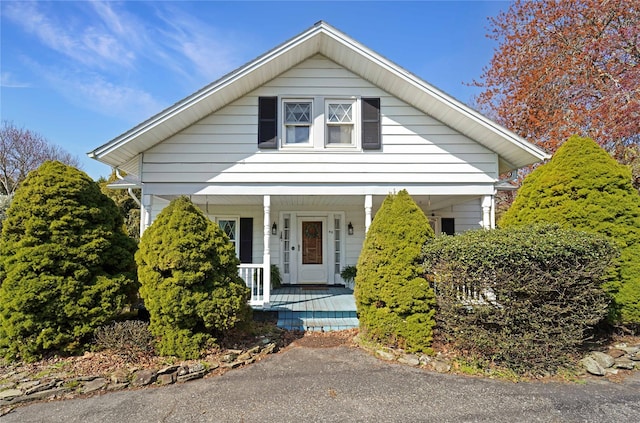 48 Watchogue Ave, East Moriches, NY 11940 - bungalow-style house with a porch