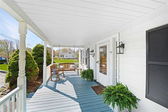 48 Watchogue Ave, East Moriches, NY 11940 - deck with a porch