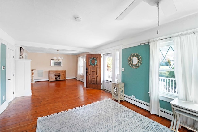 48 Watchogue Ave, East Moriches, NY 11940 - foyer entrance with beam ceiling, wood finished floors, baseboards, and ceiling fan with notable chandelier