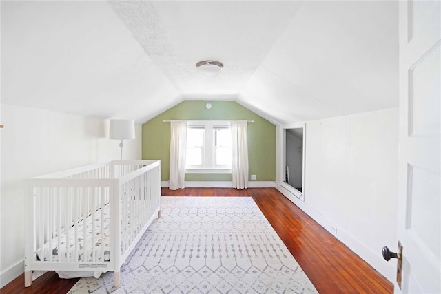 48 Watchogue Ave, East Moriches, NY 11940 - bonus room with vaulted ceiling, wood finished floors, and baseboards