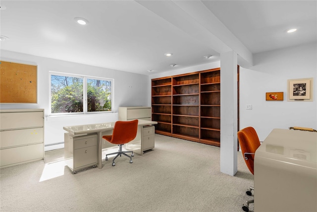 office featuring a baseboard heating unit, light carpet, and recessed lighting