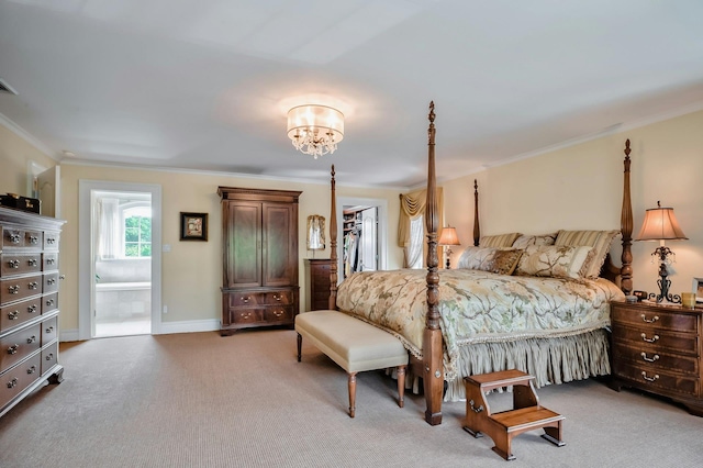 bedroom featuring crown molding, light colored carpet, ensuite bath, baseboards, and a notable chandelier