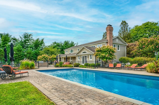 view of pool featuring fence, a patio, and a fenced in pool
