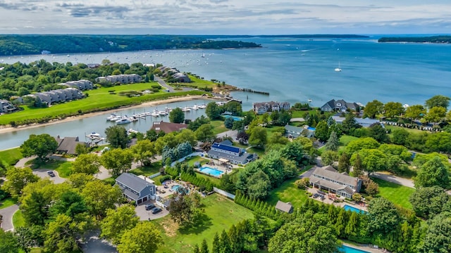 bird's eye view with a residential view and a water view
