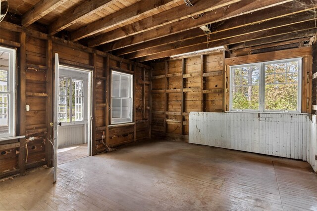 26705 Main Rd, Cutchogue, NY 11935 - misc room featuring wood walls and hardwood / wood-style floors