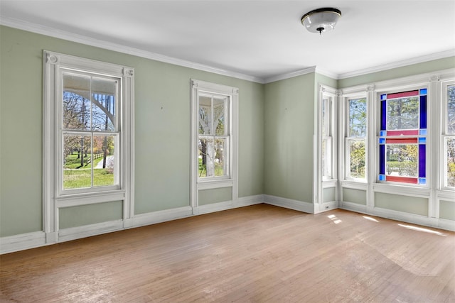 26705 Main Rd, Cutchogue, NY 11935 - unfurnished room with wood finished floors, ornamental molding, and baseboards