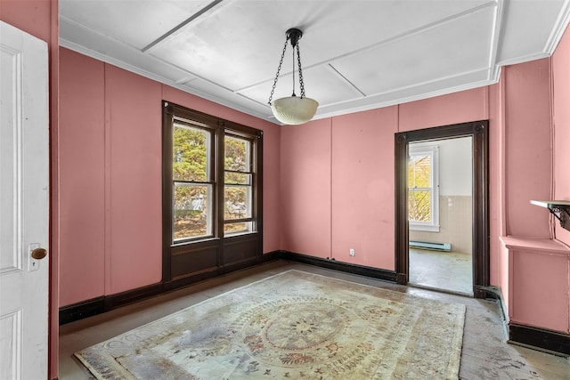 26705 Main Rd, Cutchogue, NY 11935 - spare room featuring a baseboard heating unit, a decorative wall, and crown molding
