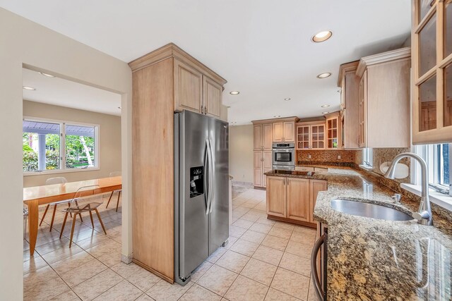 57 Seward Dr, Dix Hills, NY 11746 - kitchen with light tile patterned flooring, appliances with stainless steel finishes, a sink, stone countertops, and recessed lighting