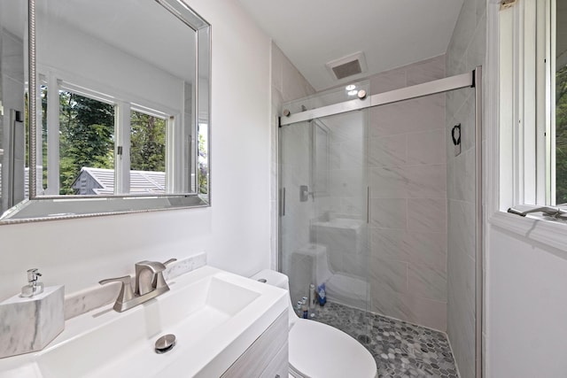 57 Seward Dr, Dix Hills, NY 11746 - full bath with toilet, visible vents, a shower stall, and vanity