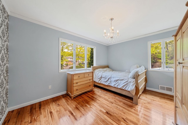 57 Seward Dr, Dix Hills, NY 11746 - bedroom with visible vents, ornamental molding, baseboards, and light wood-type flooring