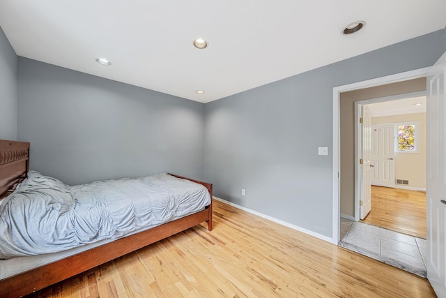 57 Seward Dr, Dix Hills, NY 11746 - bedroom featuring recessed lighting, baseboards, visible vents, and wood finished floors