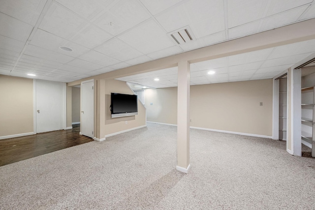 57 Seward Dr, Dix Hills, NY 11746 - finished basement featuring carpet flooring, a paneled ceiling, recessed lighting, baseboards, and visible vents