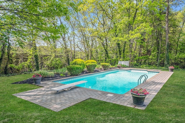 57 Seward Dr, Dix Hills, NY 11746 - pool with a patio, a diving board, and a lawn