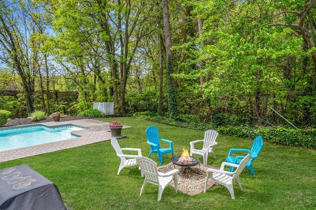57 Seward Dr, Dix Hills, NY 11746 - view of yard with fence private yard, a fire pit, and an outdoor pool
