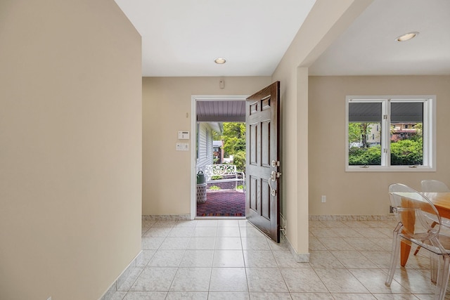 57 Seward Dr, Dix Hills, NY 11746 - foyer with recessed lighting, baseboards, and light tile patterned floors