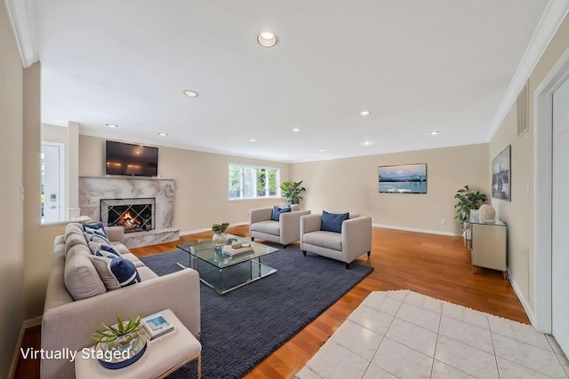 57 Seward Dr, Dix Hills, NY 11746 - living room with a fireplace, crown molding, light wood-type flooring, baseboards, and recessed lighting