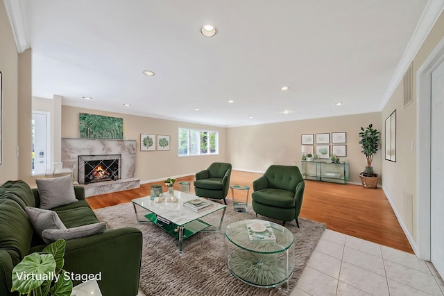 57 Seward Dr, Dix Hills, NY 11746 - living area with ornamental molding, recessed lighting, a fireplace, light tile patterned floors, and baseboards