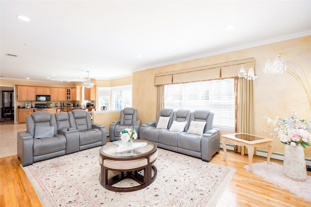 living area featuring recessed lighting, light wood-style flooring, and crown molding