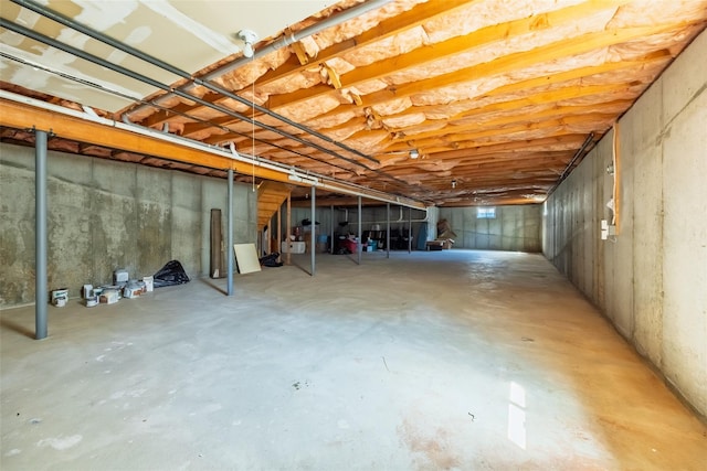 unfinished basement with stairs