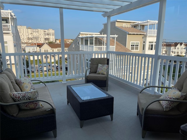 balcony with a residential view and a pergola