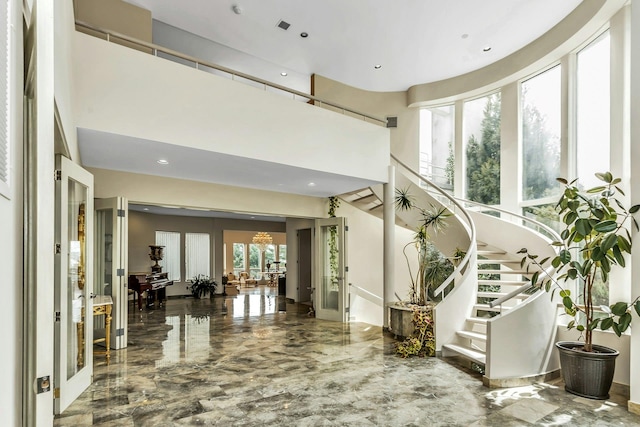 9 Dock Ln, Kings Point, NY 11024 - building lobby with stairway and a towering ceiling