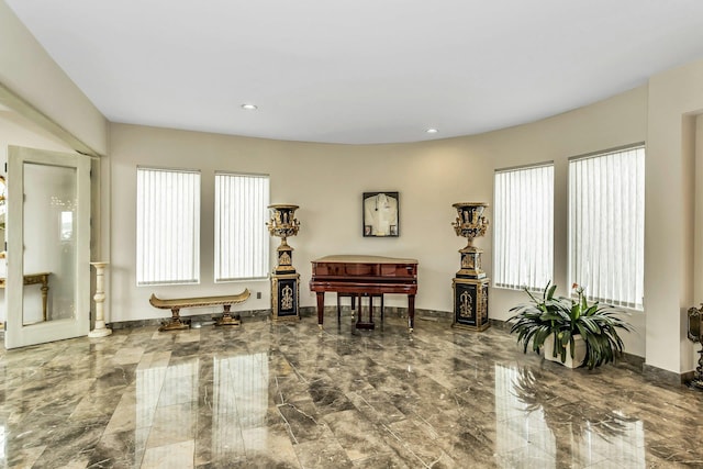 9 Dock Ln, Kings Point, NY 11024 - living area featuring marble tiled floors, baseboards, and recessed lighting