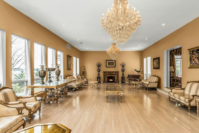 9 Dock Ln, Kings Point, NY 11024 - living room with a chandelier, wood finished floors, healthy amount of natural light, and recessed lighting