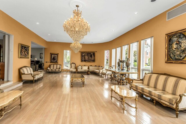 9 Dock Ln, Kings Point, NY 11024 - living area featuring a chandelier, hardwood / wood-style floors, and recessed lighting