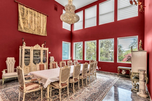 9 Dock Ln, Kings Point, NY 11024 - dining space featuring a chandelier and a high ceiling