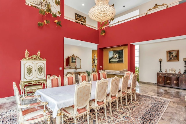 9 Dock Ln, Kings Point, NY 11024 - dining room with a chandelier, marble tiled flooring, and a towering ceiling