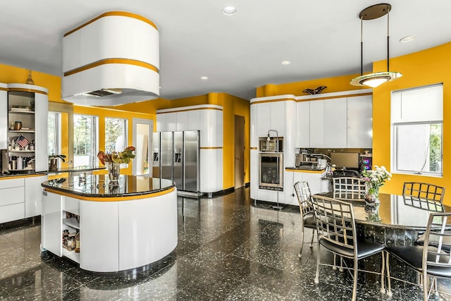 9 Dock Ln, Kings Point, NY 11024 - kitchen with appliances with stainless steel finishes, dark countertops, open shelves, white cabinets, and recessed lighting