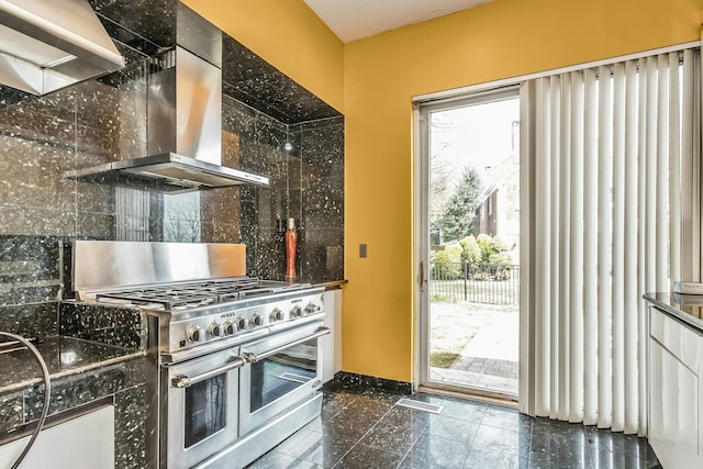 9 Dock Ln, Kings Point, NY 11024 - kitchen featuring double oven range, wall chimney range hood, backsplash, and healthy amount of natural light