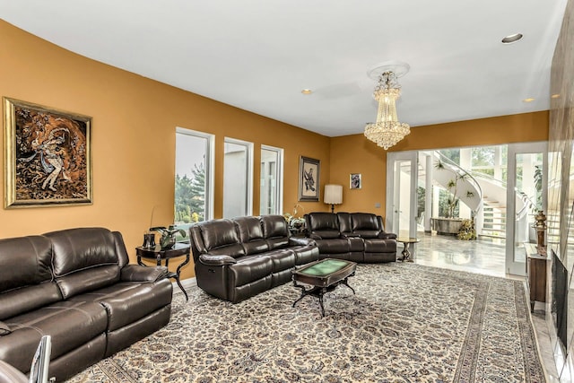 9 Dock Ln, Kings Point, NY 11024 - living room featuring a chandelier and recessed lighting