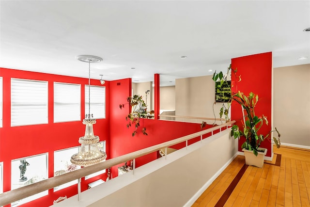 9 Dock Ln, Kings Point, NY 11024 - hall featuring baseboards, hardwood / wood-style flooring, and recessed lighting