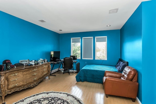 9 Dock Ln, Kings Point, NY 11024 - bedroom with hardwood / wood-style flooring, an office area, and baseboards
