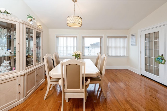 258 Longstreet Ave, Bronx, NY 10465 - dining room featuring light wood-style flooring, a healthy amount of sunlight, and lofted ceiling