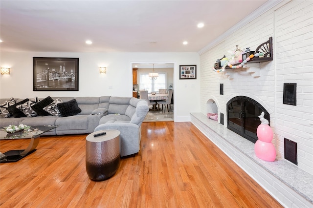 258 Longstreet Ave, Bronx, NY 10465 - living room with visible vents, wood finished floors, a brick fireplace, and recessed lighting
