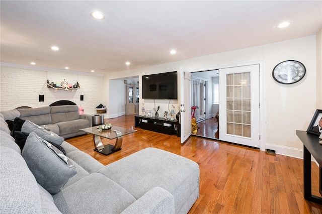 258 Longstreet Ave, Bronx, NY 10465 - living area with recessed lighting, light wood finished floors, and baseboards