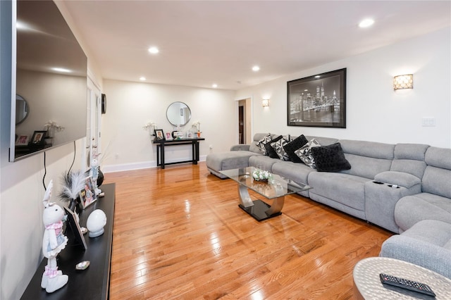 258 Longstreet Ave, Bronx, NY 10465 - living room featuring recessed lighting and light wood-style flooring